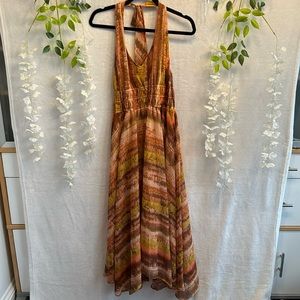 This a beautiful dress is open from the back very sexy. So nice for spring.